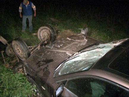 Accident cu patru victime la Urvind: Un BMW a spulberat o căruţă (FOTO)